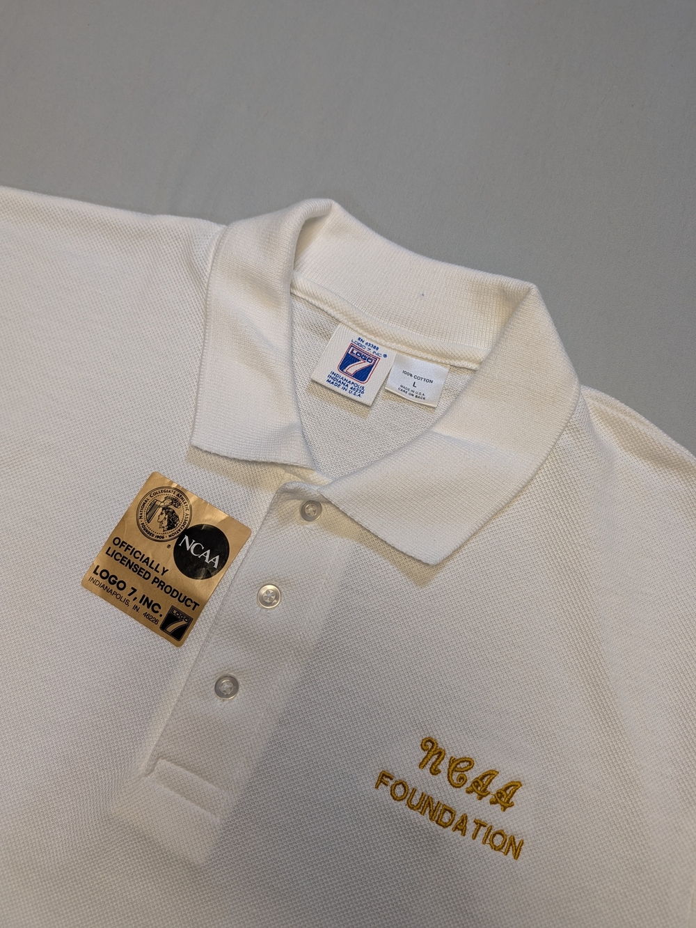 Vintage NWT LOGO 7  NCAA Foundation White Polo Shirt Men's Size Large Made USA